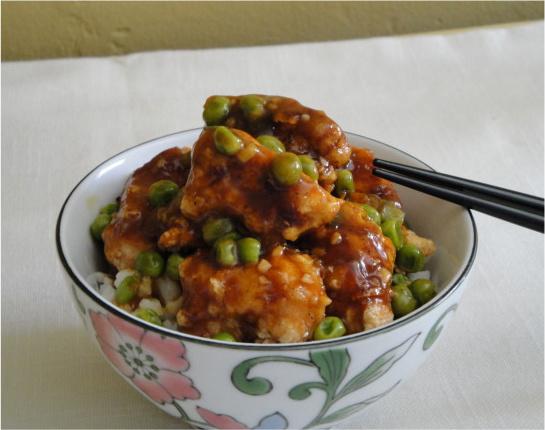 Restaurant Style Chinese Orange Chicken With Spring Peas. Photo by Debbwl