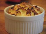 Twice-Baked Goat Cheese Souffl&eacute;s on a Bed of Mixed Greens