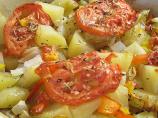 Potato Gratin With Peppers, Onions, and Tomatoes