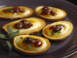 Cr&egrave;me De Brie&reg; Mango-Cranberry Crostini