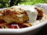 Baked Chicken Parmesan over Pasta. Recipe by Starrynews