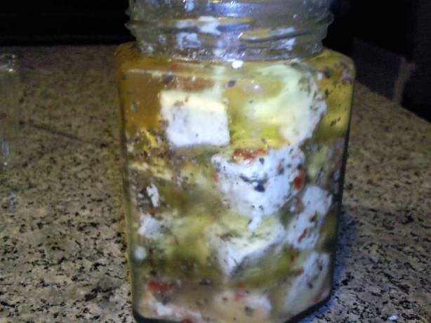 Marinated Feta Cheese With Orange, Green Olives, and Garlic. Photo by Coasty