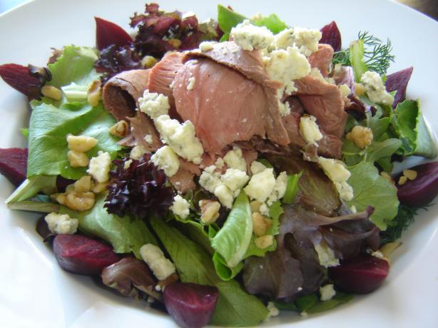 Alouette Crumbled Goat Cheese Ny Grilled Strip Steak Salad of Gr. Photo by karenury