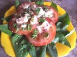 Tomato Salad With Goat Cheese. Photo by Bergy