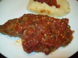 Greek Keftethes Covered in Tomato Sauce