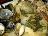 Curanto En Olla  (Steamed Seafood, Meats, Potato Bread, and Vege