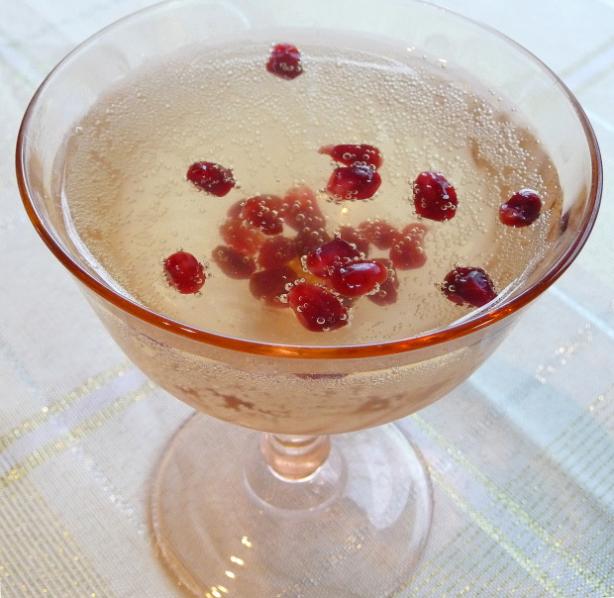 Pomegranate Cranberry Champagne Cocktail. Photo by BecR