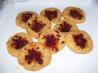 Cheddar Pecan Thumbprints With Jalapeno Jelly and Cranberries. Recipe by gritsnla