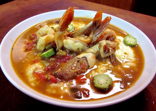 Shrimp and Crab Gumbo over Cheese Grits. Photo by Rinshinomori