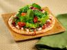 Light Salami and Feta Mini Pizzas With Tossed Greens. Recipe by Dole