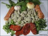 Gnocchi Con Salsicce, Rucola E Pomodoro Secc. Photo by Skipper/Sy
