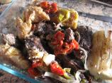 Baho (Beef, Plantains and Yuca Steamed in Banana Leaves)