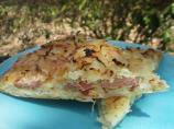 Pizza With Sausage, Sauerkraut & Swiss Cheese