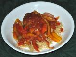 Braised Chicken Thighs With Bell Peppers, Olives and Tomatoes
