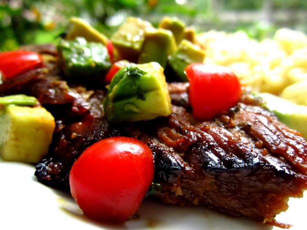 Honey-Lime Grilled Skirt Steak With Avocado-Tomato Relish. Photo by gailanng