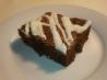 Dark Chocolate Chunk Brownies With Sweet Cream Cheese Drizzle. Recipe by lexandlil1022