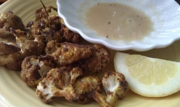 Roasted Cauliflower With Ras El Hanout Tahini Sauce. Photo by threeovens
