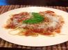 Cheesy Arrabbiata over Linguine. Photo by Dr. Jenny