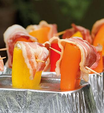Mini Peppers Stuffed With Cheese and Topped With Bacon - Grilled. Photo by Viclynn