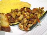Zucchini Stuffed With Tomato, White Beans, and Pesto