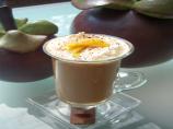 Orange Coffee Topped With Honey Nougat Chocolate And Orange Peel