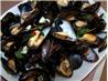 Steamed Garlic and Herb Mussels. Recipe by Latchy