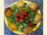 corn fritters w/arugula and warm tomatoes