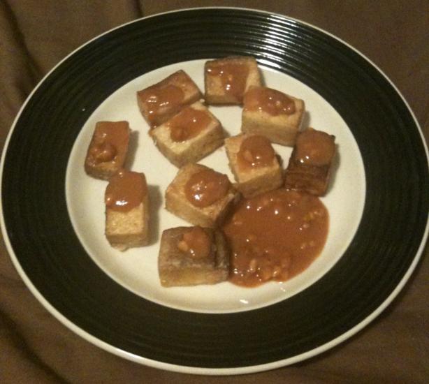 Pan-Fried Tofu with Spicy Peanut Sauce. Photo by DrGaellon