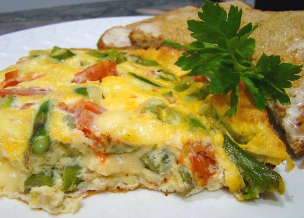 Frittata with Asparagus, Tomato, and Fontina. Photo by Derf