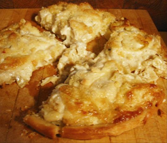 Easy Cheesy Artichoke Bread. Photo by Caroline Cooks