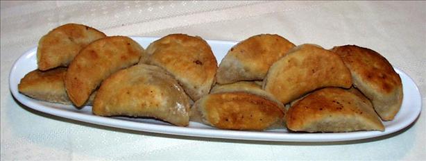 Cretan Kalitsounia (Sweet Cheese Pastries). Photo by twissis