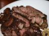 Rib-eye steaks with merlot-mushroom melange. Recipe by Hey Jude