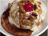 Grilled Pineapple Topped With Ice Cream and Candied Walnuts
