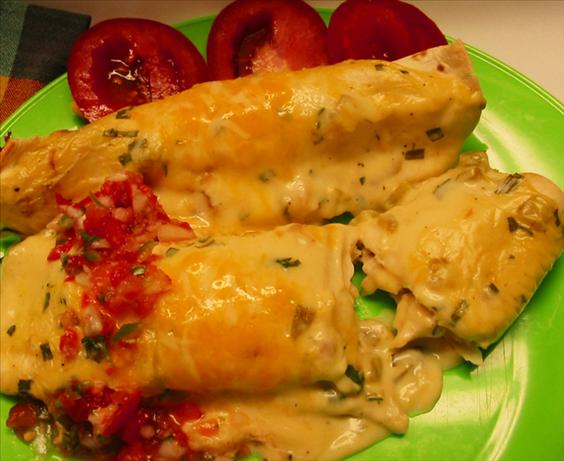 Easy Cheese and Sour Cream Enchiladas. Photo by Caroline Cooks