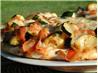 Zucchini and Fresh Tomato Pizza With Fontina
