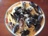 Garlicky Mussels in a Rich Lemon, Fresh Herb, Butter Sauce