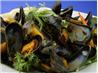 Garlicky Mussels in a Rich Lemon, Fresh Herb, Butter Sauce