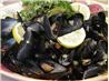 Garlicky Mussels in a Rich Lemon, Fresh Herb, Butter Sauce