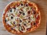 Artichoke Sun-Dried Tomato Pizza. Recipe by Shannon Holmes