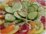 Tomato and Cucumber Salad With a Pesto Like Dressing.